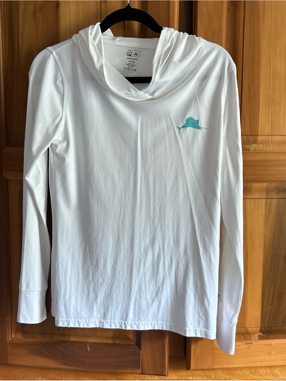 Pelagic White Performance Shirt with turquoise heart Logo Print